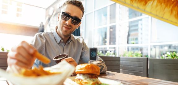 Man eating at restaurant